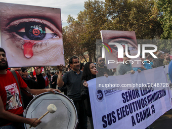 Chilean workers take part in a May Day march in Santiago on May 1, 2018. (