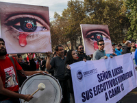 Chilean workers take part in a May Day march in Santiago on May 1, 2018. (