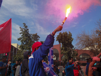 Chilean workers take part in a May Day march in Santiago on May 1, 2018. (