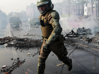 Riot police during May Day march in Santiago on May 1, 2018. (