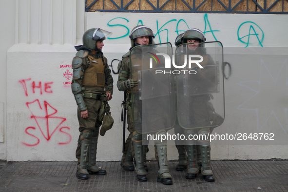 Riot police during  May Day march in Santiago on May 1, 2018. 