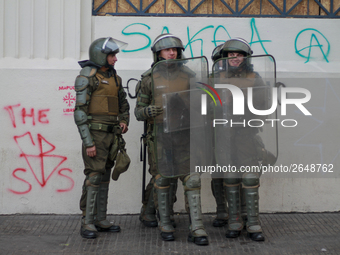 Riot police during  May Day march in Santiago on May 1, 2018. (