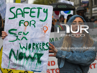 A young woman holds 'Safety for Sex Workers Now!' sign during an annual May Day march for workers' rights.
On Tuesday, May 1, 2018, in Dubli...