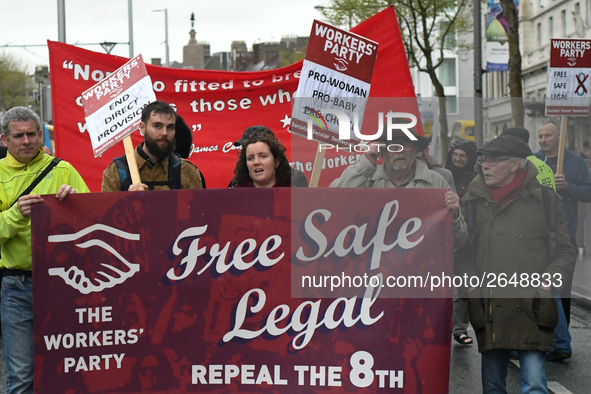 Members of the Workers' Party carry 'Free Safe Legal' banner during an annual May Day march for workers' rights.
On Tuesday, May 1, 2018, in...