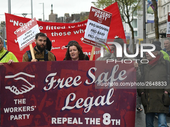 Members of the Workers' Party carry 'Free Safe Legal' banner during an annual May Day march for workers' rights.
On Tuesday, May 1, 2018, in...