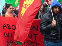 Activists carry 'Abortion Without Apology' banner during an annual May Day march for workers' rights.
On Tuesday, May 1, 2018, in Dublin, Ir...