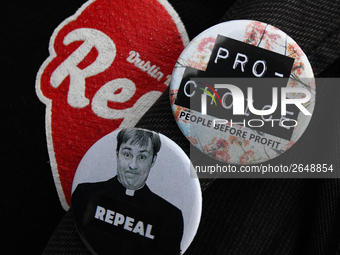 Pro-Choice, Repeal and Father Dougal Repeal signs during a march, as Hundreds of people including SIPTU unions, Right2Work campaigners, memb...