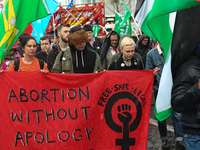 Activists carry 'Abortion Without Apology' banner during an annual May Day march for workers' rights.
On Tuesday, May 1, 2018, in Dublin, Ir...