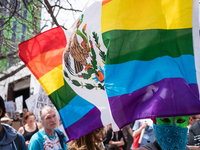 Demonstrators march towards Haymarket Square for May Day, also known as International Workers’ Day, in Chicago on May 1, 2018. (