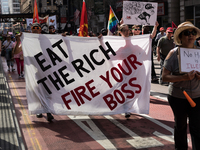 Demonstrators march towards the Thompson Center for May Day, also known as International Workers’ Day, in Chicago on May 1, 2018. (