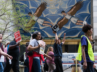 Demonstrators march towards the Thompson Center for May Day, also known as International Workers’ Day, in Chicago on May 1, 2018. (