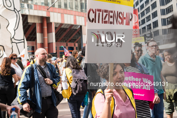 Demonstrators march towards Immigration and Customs Enforcement's (ICE) Chicago headquarters for May Day, also known as International Worker...