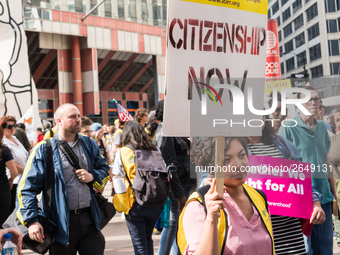 Demonstrators march towards Immigration and Customs Enforcement's (ICE) Chicago headquarters for May Day, also known as International Worker...