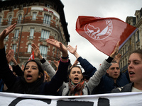 Students shout slogans against Macron's policies. Several sectors on strike called to a protest and a gathering in front of the Préfecture a...