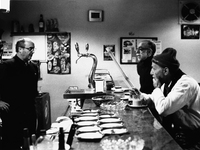 Alfonso and Fernando, pilgrims traveling to Santiago de Compostela, in a breakfast bar, in Roncesvalles, Spain, on December 2004  (