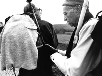 Venezuelan pilgrims Fernando and Alfonso settle the backpack on the way, in Burguete, Spain, December 2004 
 (