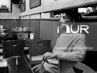 An elderly man in a bar after dinner, in Laransoana, Spain, on December 2004  (