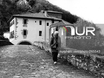 The bridge and the church of the Holy Trinity, in Trinidad de Arre, Spain, on December 2004 (