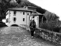 The bridge and the church of the Holy Trinity, in Trinidad de Arre, Spain, on December 2004 (