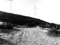 Along the climb to Alto del Perdòn you see on the top of the sierra tech windmills that harness the considerable wind energy in the area, in...