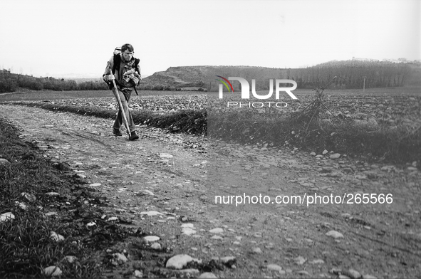 The French pilgrim Joan Cristophe, on the road to Santiago de Compostela, collects and carries the plastic waste lies along the trails, in Z...