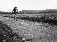 The French pilgrim Joan Cristophe, on the road to Santiago de Compostela, collects and carries the plastic waste lies along the trails, in Z...