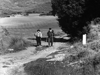 Two Catalan pilgrims along the climb to the sierra, in the Perdòn Alto, Spain, on December 2004  (