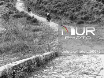 Two pilgrims cyclists departed from Puente la Reina in a short time they reached the old Roman road, the glory of the great imperial route t...