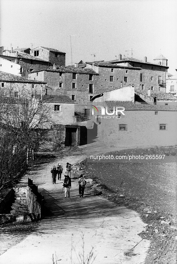 A group of pilgrims makes entry into the town, in Torres del Rio, Spain, on December 2004  