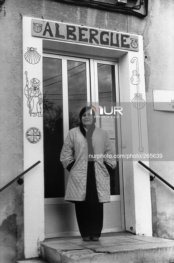 The Hospitalera Stephane manages the Municipal refuge, in Montes de Oca, Spain, on December 2004  