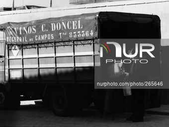 Vendor of wine in bulk, in Villamentero de Campos, Spain, on December 2004  (