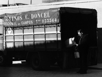 Vendor of wine in bulk, in Villamentero de Campos, Spain, on December 2004  (