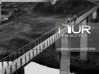 The bridge over "emblase  de Belesar" (artificial lake), in Portomarin, Spain, on December 2004  (