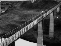 The bridge over "emblase  de Belesar" (artificial lake), in Portomarin, Spain, on December 2004  (