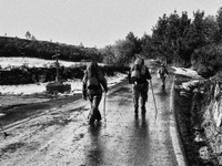 A group of pilgrims headed to Palais del Rei, in Alto del Rosario, Spain, on December 2004 (