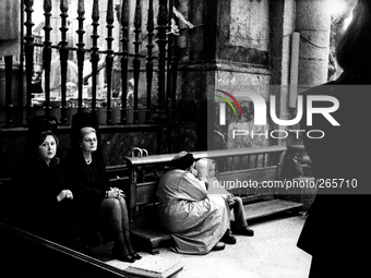 Pious Women in the cathedral during the mass arrival of the pilgrims, in Santiago de Compostela, Spain, on December 2004  (