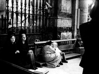 Pious Women in the cathedral during the mass arrival of the pilgrims, in Santiago de Compostela, Spain, on December 2004  (