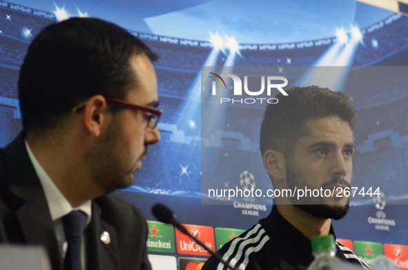 Real Madrid's Isco, right, speaks during a news conference at the Vassil Levski stadium in the Bulgarian capital Sofia, Tuesday, Sept. 30, 2...