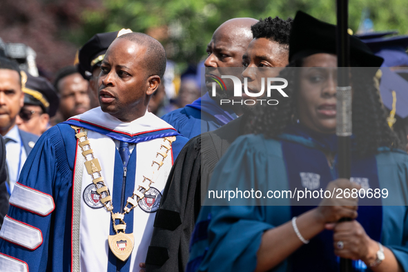 (L-R): Howard University President Dr. Wayne A.I. Frederick, and actor and alumnus Chadwick Boseman, participate in the processional for the...