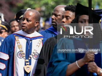 (L-R): Howard University President Dr. Wayne A.I. Frederick, and actor and alumnus Chadwick Boseman, participate in the processional for the...