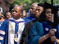 (L-R): Howard University President Dr. Wayne A.I. Frederick, and actor and alumnus Chadwick Boseman, participate in the processional for the...