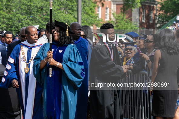 (L-R): Howard University President Dr. Wayne A.I. Frederick, and actor and alumnus Chadwick Boseman, participate in the processional for the...