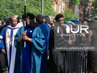 (L-R): Howard University President Dr. Wayne A.I. Frederick, and actor and alumnus Chadwick Boseman, participate in the processional for the...