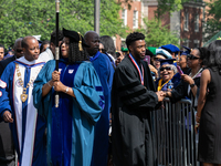 (L-R): Howard University President Dr. Wayne A.I. Frederick, and actor and alumnus Chadwick Boseman, participate in the processional for the...