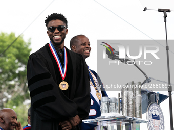 (L-R): Actor and alumnus Chadwick Boseman speaks, with Howard University President Dr. Wayne A.I. Frederick by his side, at the commencement...