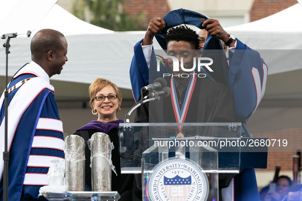 Actor and alumnus Chadwick Boseman (center), participates in a hooding receiving an honorary degree, Doctor of Humane Letters. as Howard Uni...