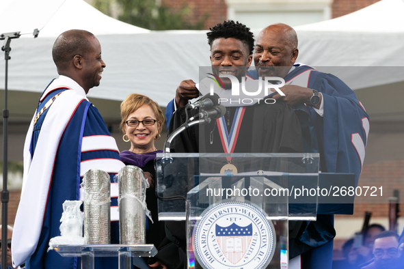 Actor and alumnus Chadwick Boseman (center), participates in a hooding receiving an honorary degree, Doctor of Humane Letters. as Howard Uni...