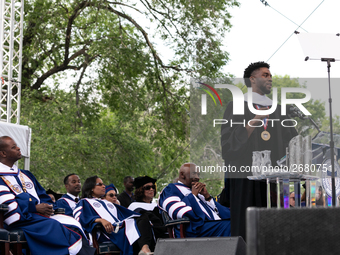 Actor and alumnus Chadwick Boseman (R), delivers the keynote address at Howard University's commencement ceremony for the 2018 graduating cl...