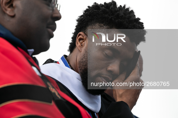 Actor and alumnus Chadwick Boseman (R), after he delivered the keynote address at Howard University's commencement ceremony for the 2018 gra...