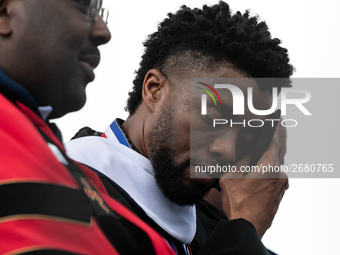 Actor and alumnus Chadwick Boseman (R), after he delivered the keynote address at Howard University's commencement ceremony for the 2018 gra...